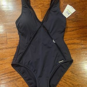 Stunning yet sporty Michael Kors navy one piece bathing suit with subtle logo